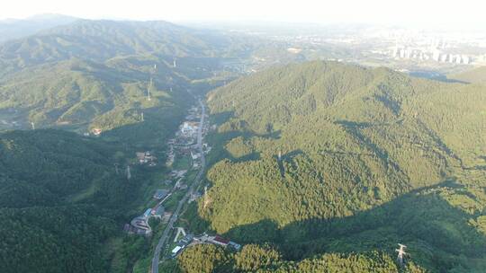 航拍大山山谷中乡村公路