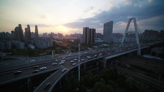 武汉金桥立交桥航拍延时摄影车夕阳大楼视频素材模板下载