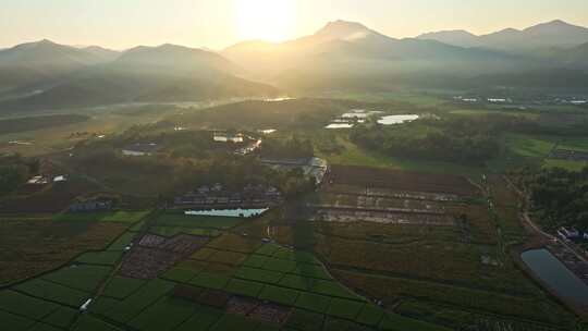 中国侨乡广东台山乡村稻田山脉山峰日出航拍