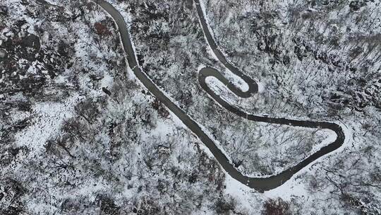 冬天雪后大山公路交通航拍