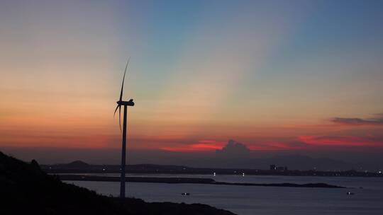 风车夕阳日落晚霞海边唯美风景日出风力发电