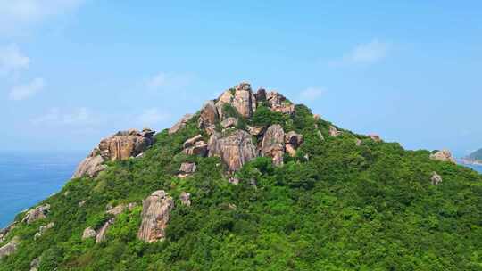 海南陵水虎岭尖岭航拍大海海岸线与绿色山脉