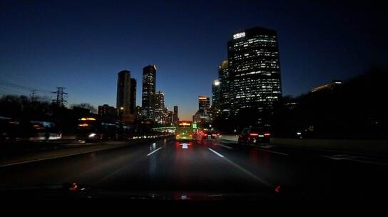 北京城市晚霞穿梭夜景