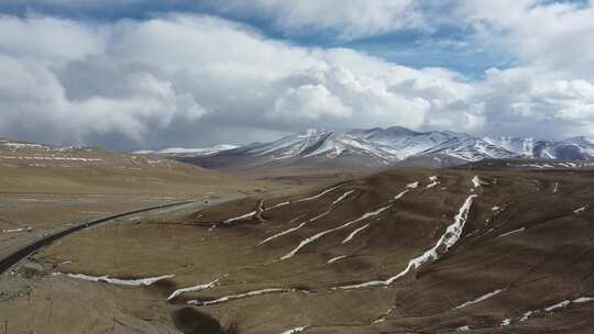 航拍新疆南疆帕米尔高原大气雪山公路景色