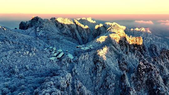 航拍安徽黄山日出雪山风光4K