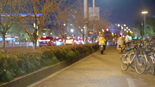 都市城市夜晚夜景人群行人人流汽车车辆车流