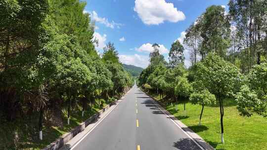 乡村县道公路片头航拍风景运输穿梭建设美丽