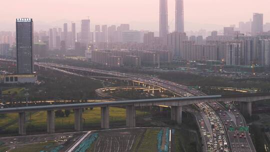 航拍夕阳杭州萧山钱江世纪城机场城市大道