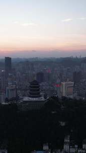 竖版航拍贵阳东山寺晚霞夜幕降临