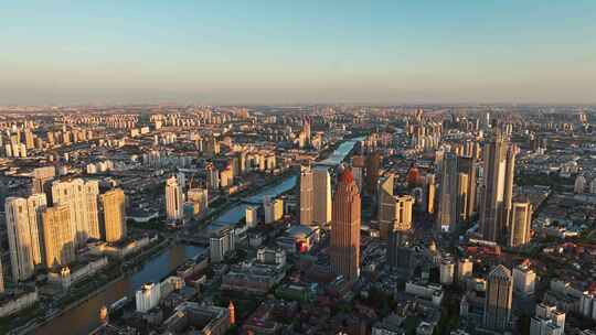 航拍夕阳下天津海河两岸城市建筑