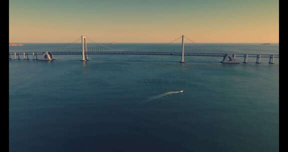 大连航拍海边跨海湾大桥唯美岩壁大海夕阳
