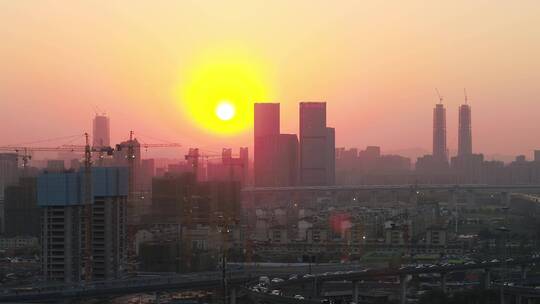 航拍夕阳下杭州萧山机场城市大道高架
