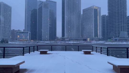 城市下雪高楼大厦河流