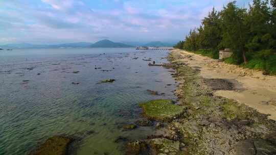 航拍海南三亚西岛海洋文化旅游区海浪礁石