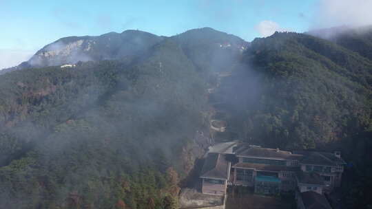 江西某地航拍大山深处村庄森林云海大远景