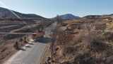 山间蜿蜒公路航拍景象高清在线视频素材下载