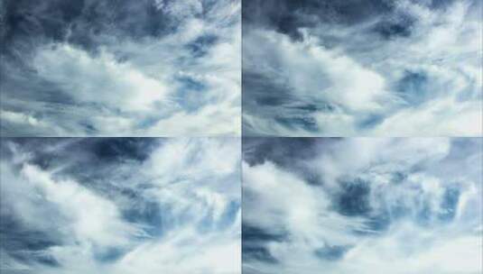 在深蓝色天空的衬托下，云层层层叠叠高清在线视频素材下载