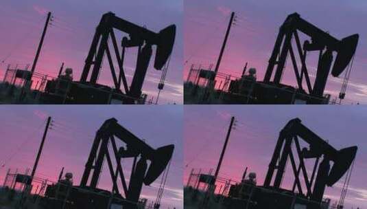 一个石油井架在傍晚工作高清在线视频素材下载