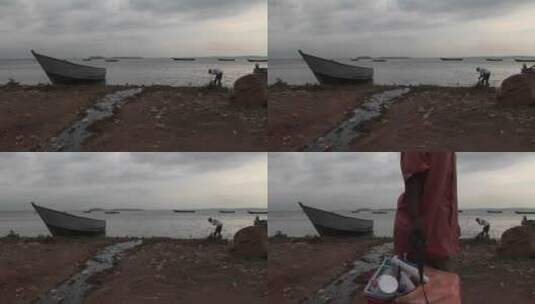 渔民在湖岸边工作高清在线视频素材下载