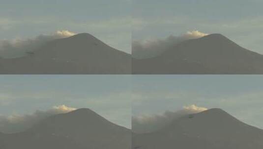 西西里岛火山山顶飞过的鸟群高清在线视频素材下载