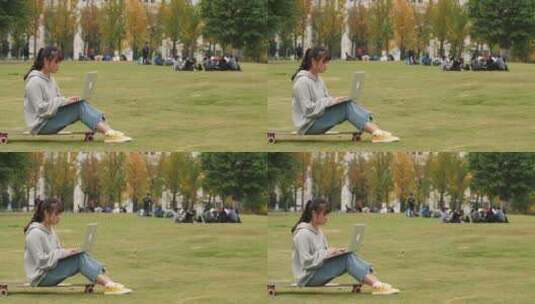 秋天校园女大学生坐在草地滑板上用电脑学习高清在线视频素材下载