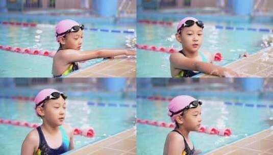 在泳池里玩耍玩水的中国女孩高清在线视频素材下载