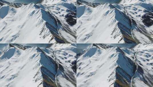 夹金山冬季航拍白雪覆盖山脊高清在线视频素材下载