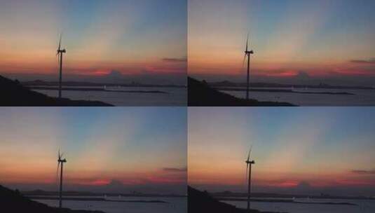 风车夕阳日落晚霞海边唯美风景日出风力发电高清在线视频素材下载