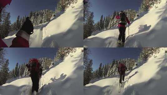 两个人在白雪覆盖的山上越野滑雪高清在线视频素材下载