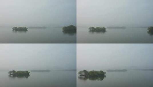 杭州春天西湖湖中三岛晨曦风光航拍高清在线视频素材下载