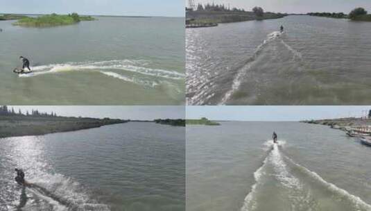 航拍动力冲浪板湖泊水面水上运动高清在线视频素材下载