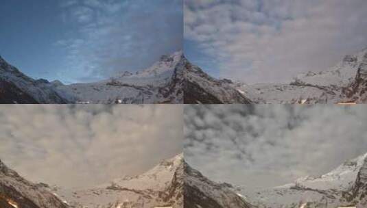 延时：萨斯费高山山脉蓝天前移动的云高清在线视频素材下载