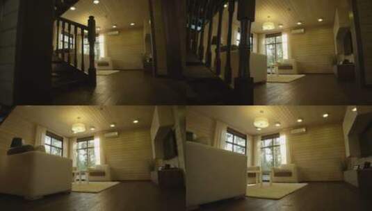 摄像机在小屋里移动的穿过楼梯到客厅高清在线视频素材下载