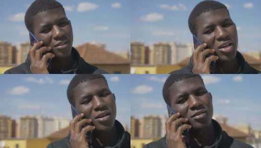 黑人青年通过电话交谈高清在线视频素材下载