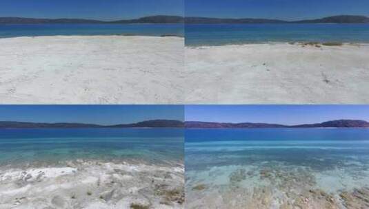 白色沙滩和蔚蓝的海水高清在线视频素材下载