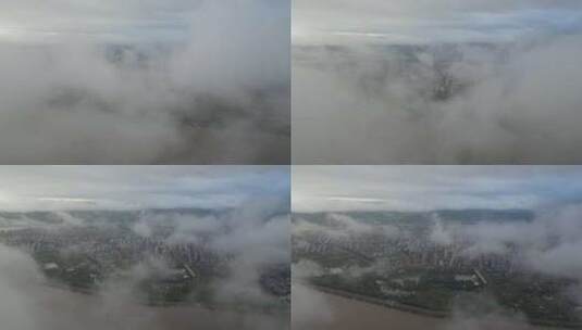 鸟瞰全市航拍穿云高清在线视频素材下载