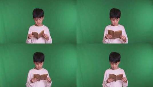 帅气的中国小男孩在读书高清在线视频素材下载