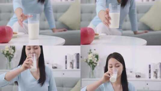 一个年轻女性在家喝牛奶高清在线视频素材下载