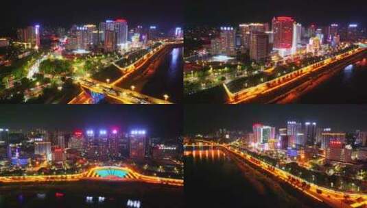 航拍陕西安康汉江沿岸夜景高楼大厦高清在线视频素材下载