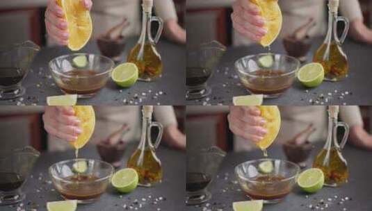女人在玻璃碗里把新鲜的橙汁挤进照烧酱油里高清在线视频素材下载