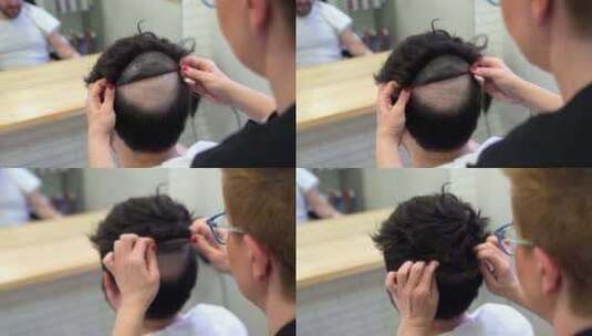 发型师用胶条给男人戴上假发高清在线视频素材下载