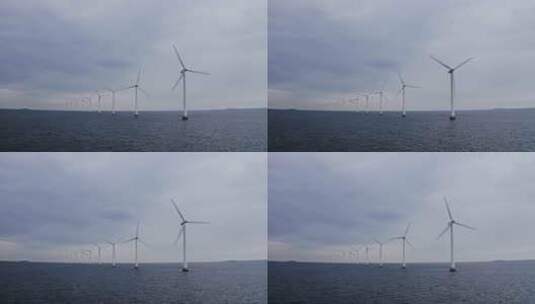 风力涡轮机在海洋空中旋转高清在线视频素材下载