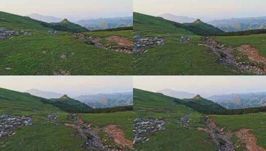 夏季高山草甸绿色森林牧场夕阳航拍高清在线视频素材下载