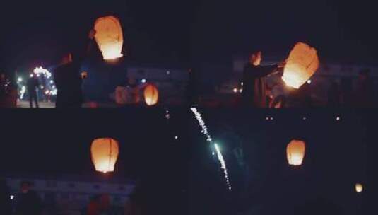 夜晚年轻人放孔明灯高清在线视频素材下载