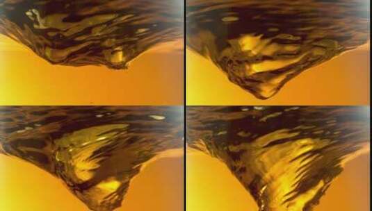 HD高速摄影旋转的液体漩涡金色高清在线视频素材下载