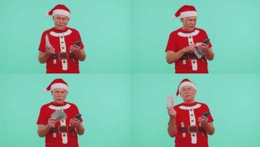 圣诞老人拿着钱玩手机高清在线视频素材下载