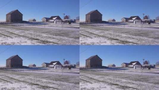 雪地里的农舍和谷仓高清在线视频素材下载