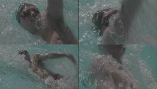 游泳运动员仰泳穿过游泳池高清在线视频素材下载