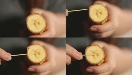 拿起一根香蕉剥香蕉皮高清在线视频素材下载