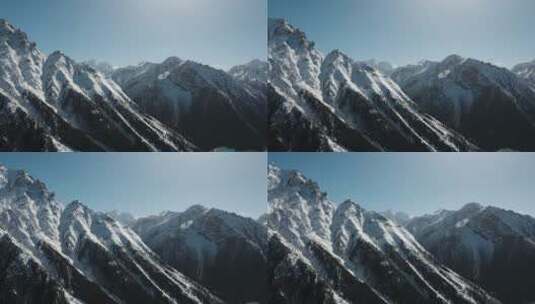 雪山近景视频青藏高原蓝天下雪山沟壑纵横高清在线视频素材下载